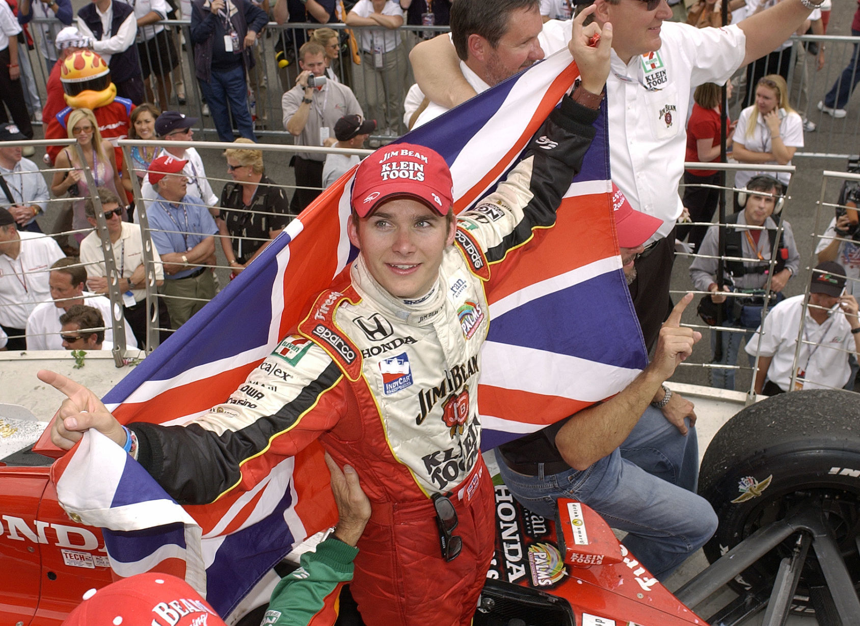 2005: Dan Wheldon wins Indianapolis 500 in same race Danica Patrick broke barriers